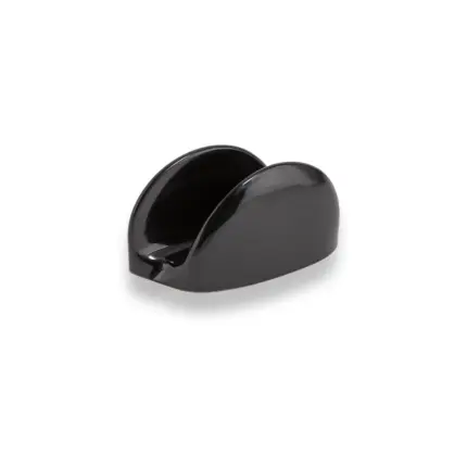 11x5,5 cm ölçülerinde ve 6 cm yüksekliğinde, parlak siyah renkli modern peçetelik ve çok amaçlı masa üstü sunum standı.