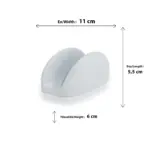 11x5,5 cm ölçülerinde ve 6 cm yüksekliğinde, parlak beyaz renkli modern peçetelik ve çok amaçlı masa üstü sunum standı.
